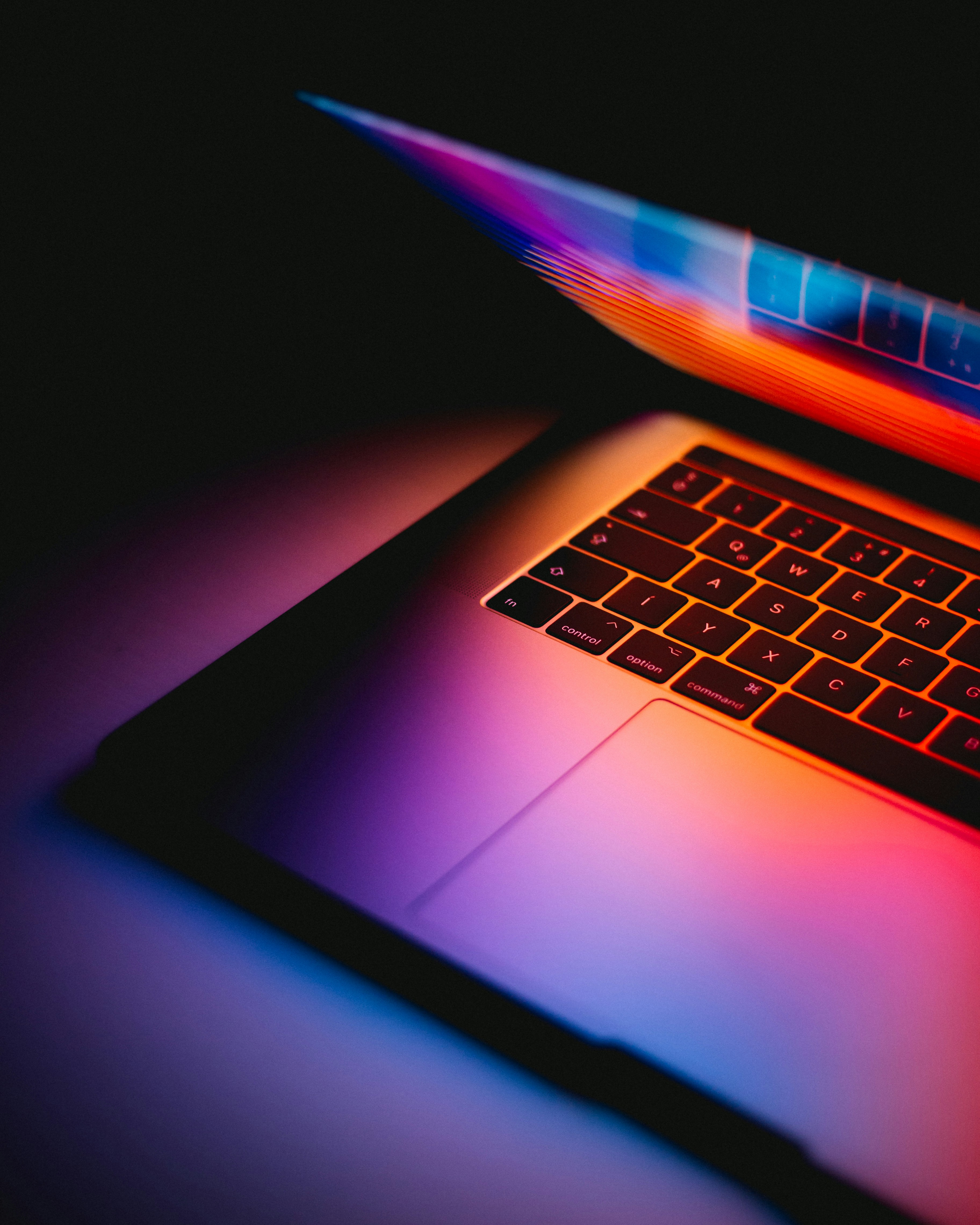 Professional website design workspace with computer showing web development